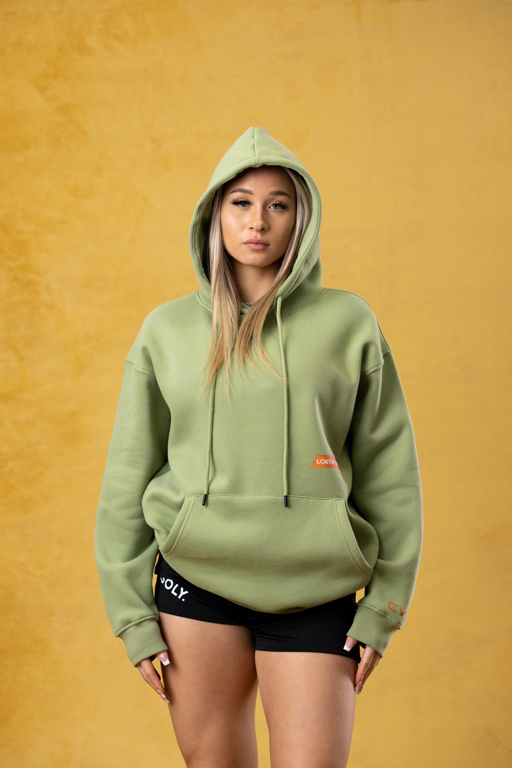 FBL. Sudadera con capucha verde matcha para mujer