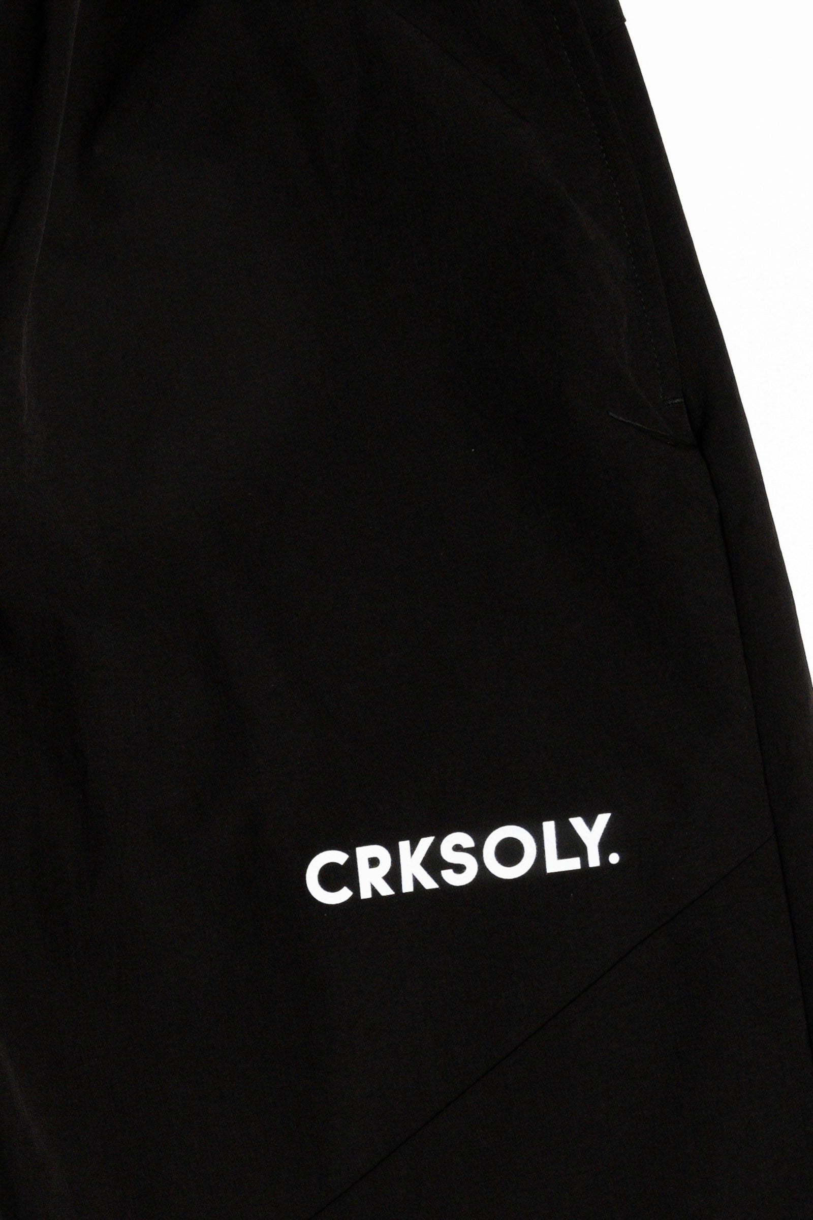 CRKSOLY. Pantalón cortavientos unisex color negro