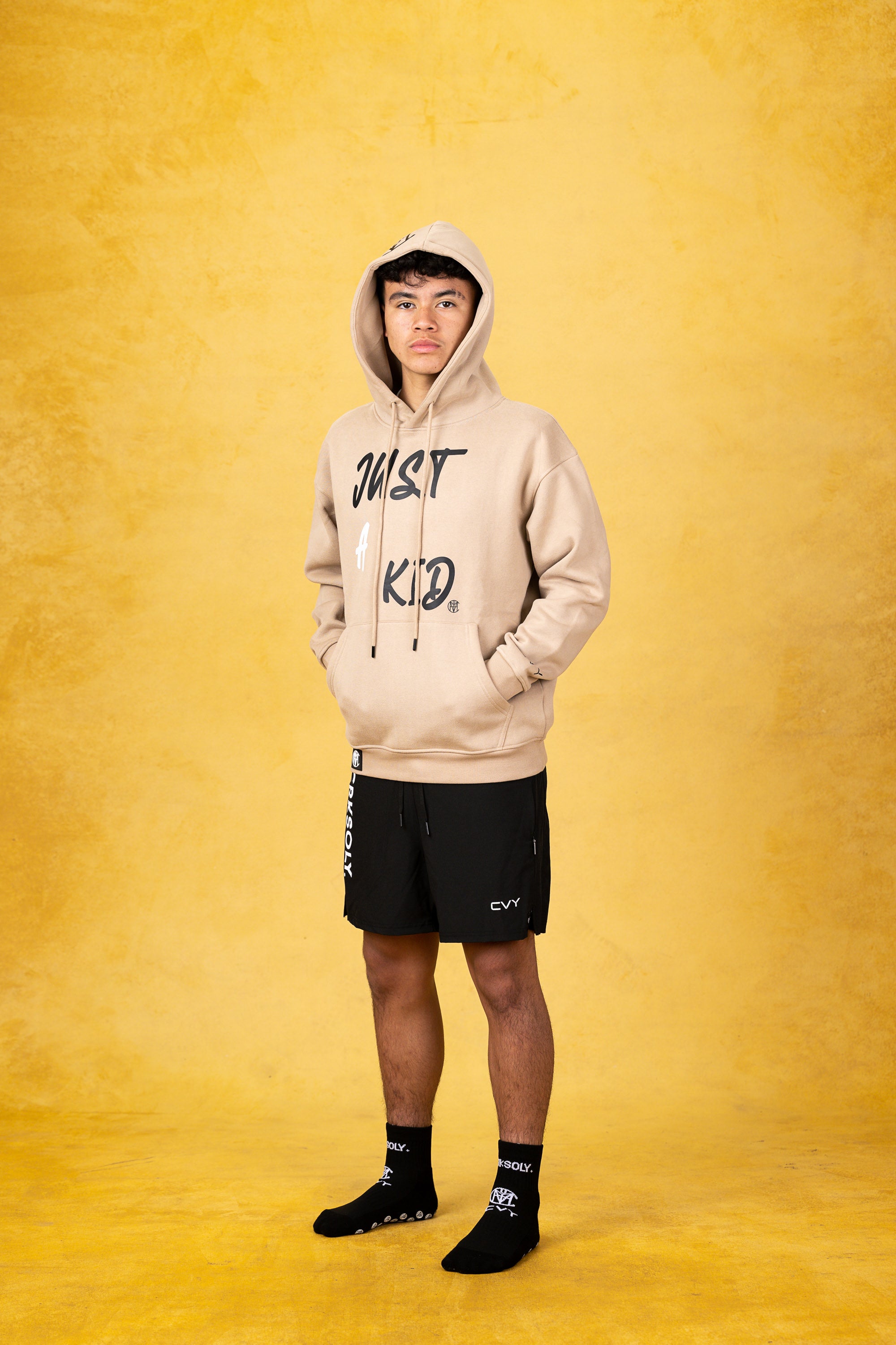 JUST A KID. Sand Youth Hoodie