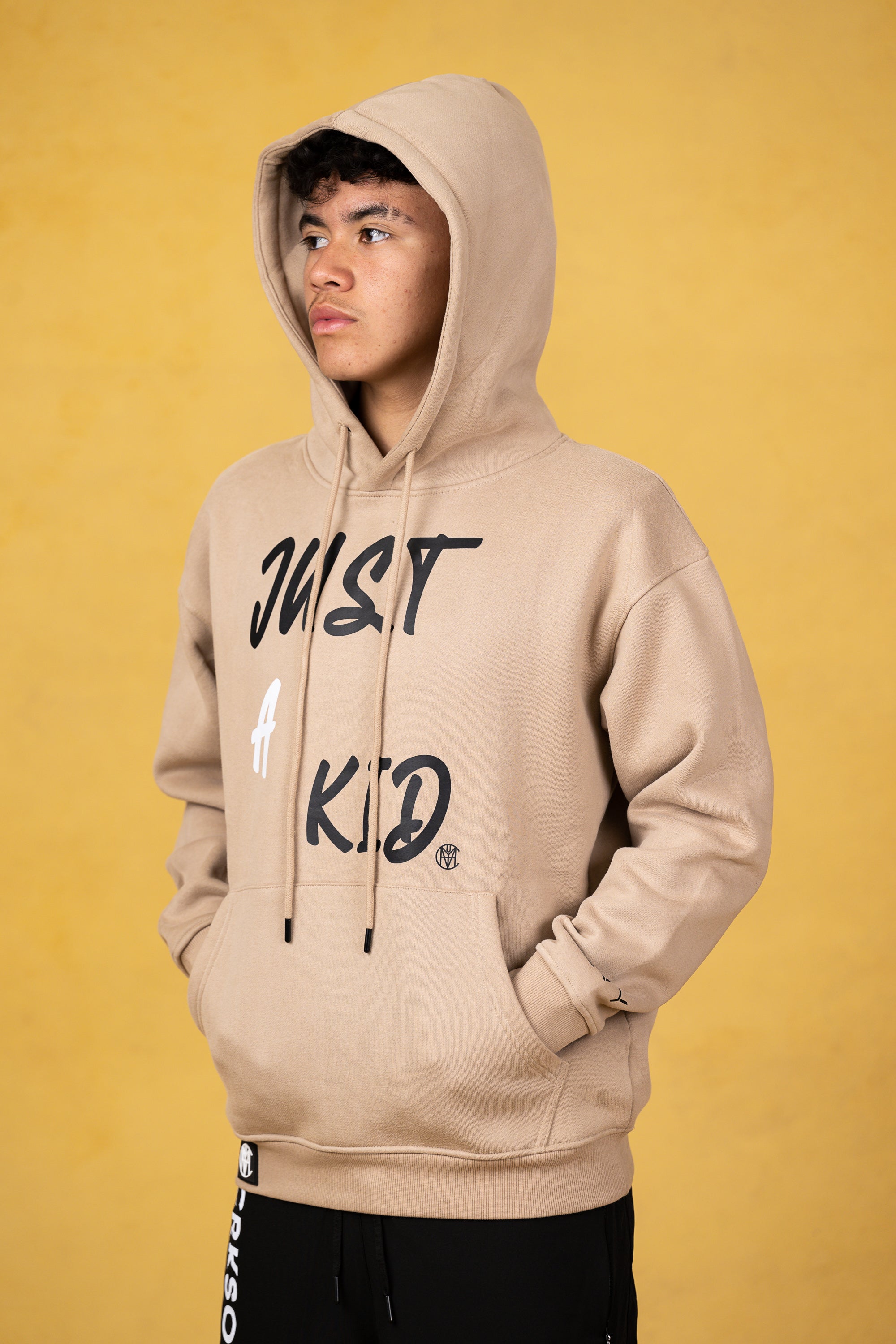 JUST A KID. Sand Youth Hoodie