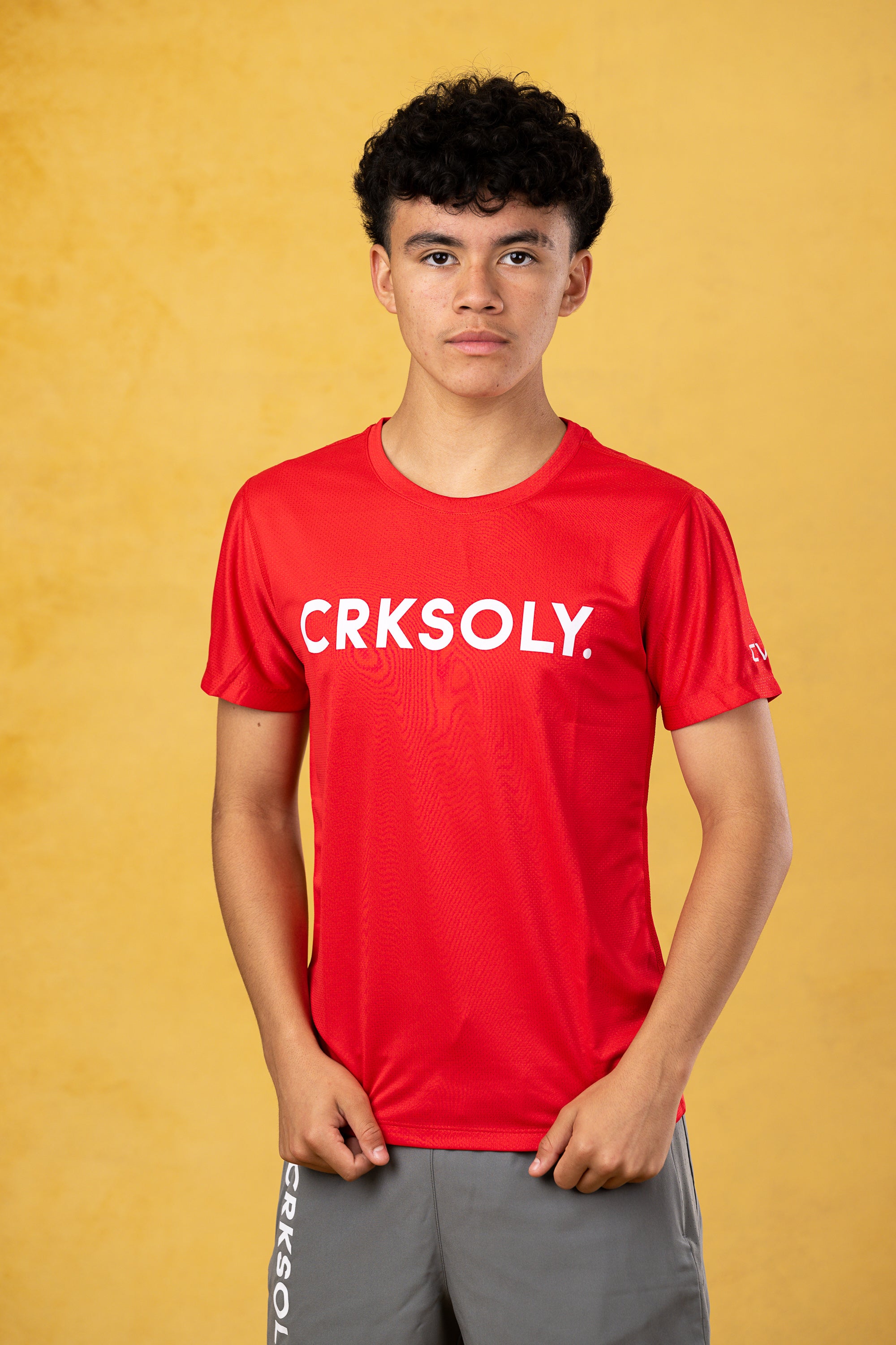 CRKSOLY. Camiseta de entrenamiento roja para jóvenes