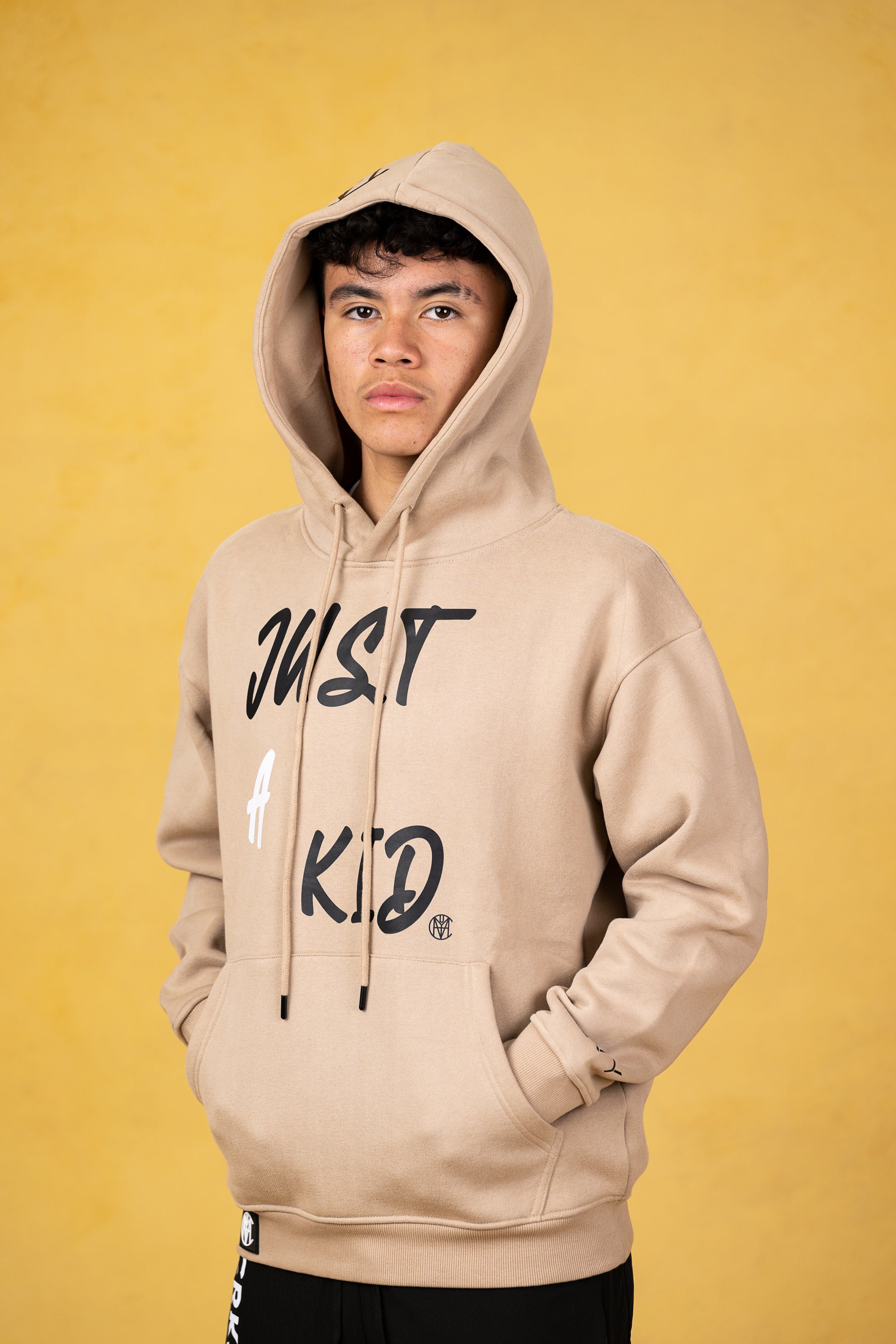 JUST A KID. Sand Youth Hoodie